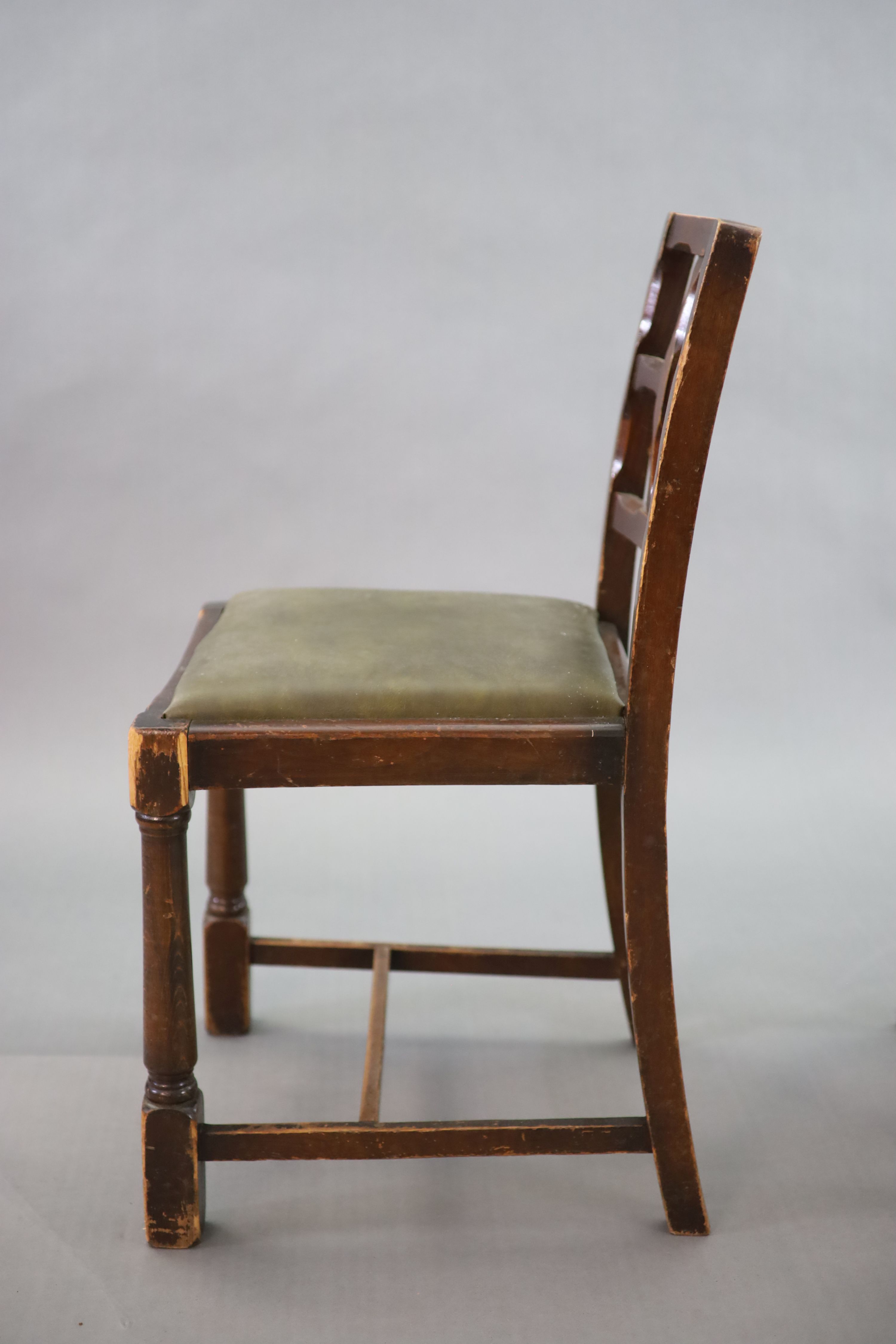 A set of eight early 20th century oak and beech dining chairs